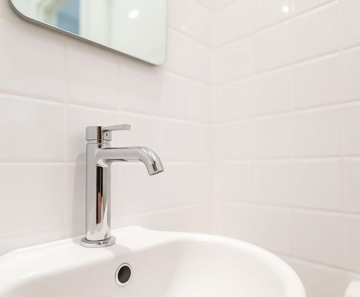 Sparkling clean apartment bathroom detail